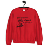 You're Never Fully Dressed Without a Smile Unisex Sweatshirt