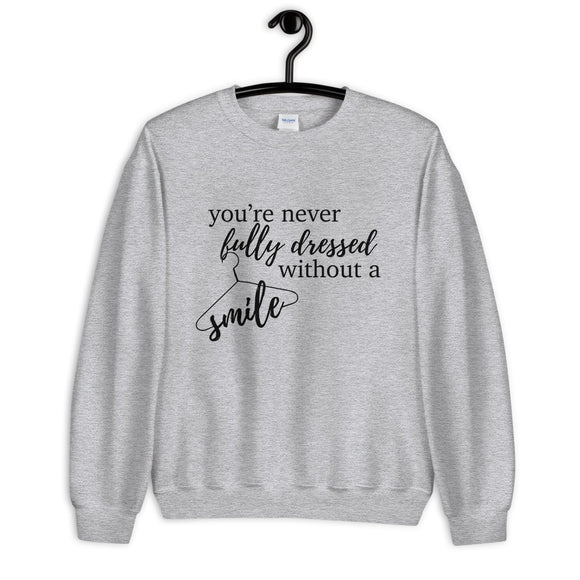 You're Never Fully Dressed Without a Smile Unisex Sweatshirt